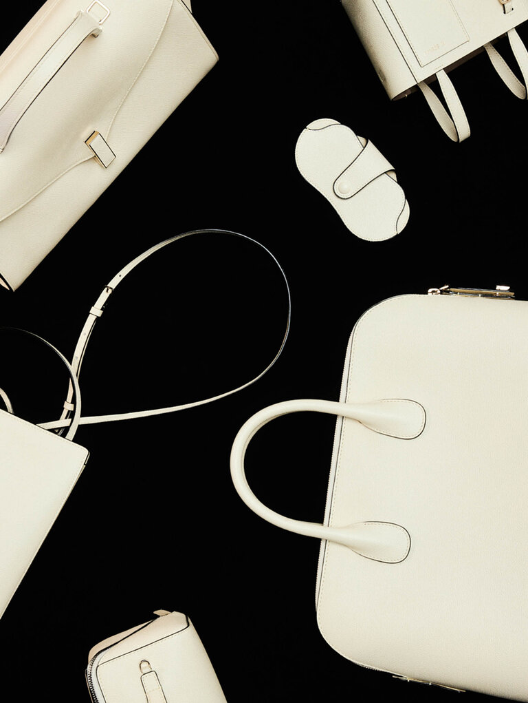 valextra leather goods in pergamena white